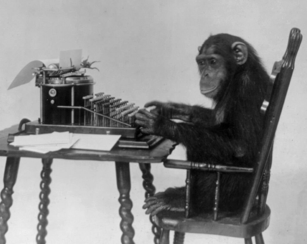Chimpanzee_seated_at_typewriter.jpg